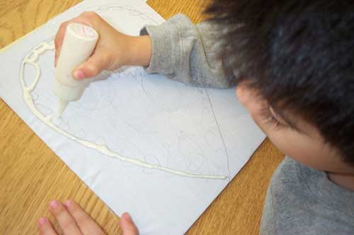 student learning paste batik